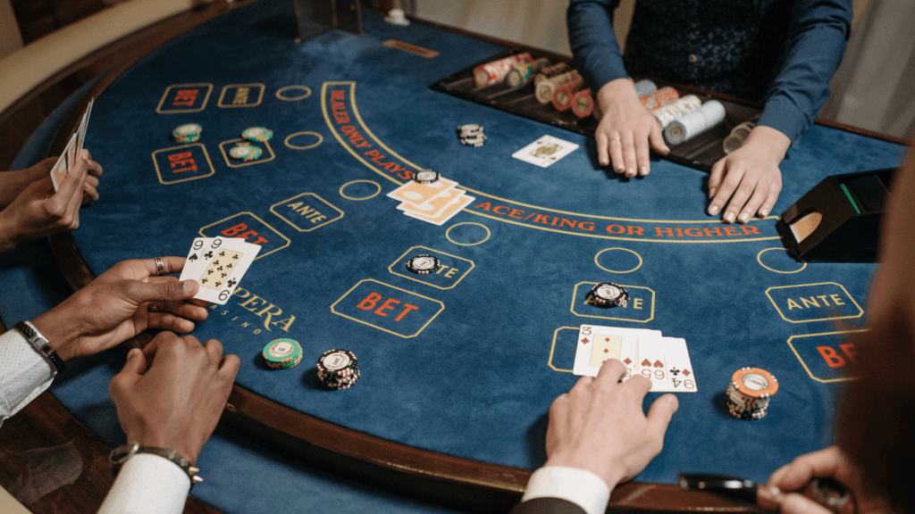 a group of people playing blackjack