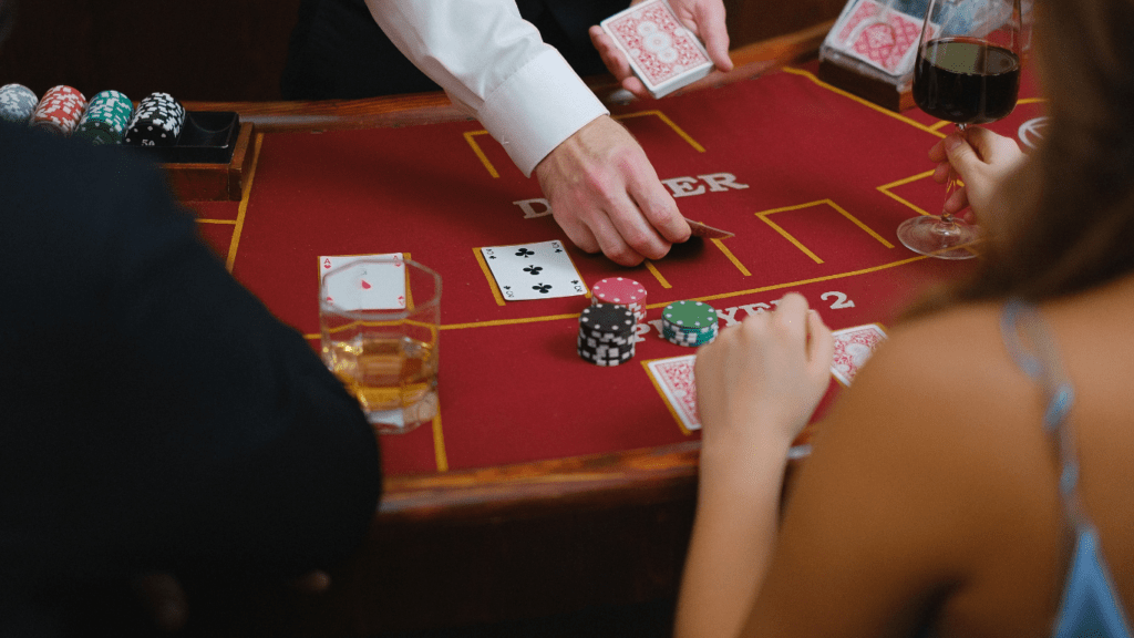 a group of people playing blackjack 