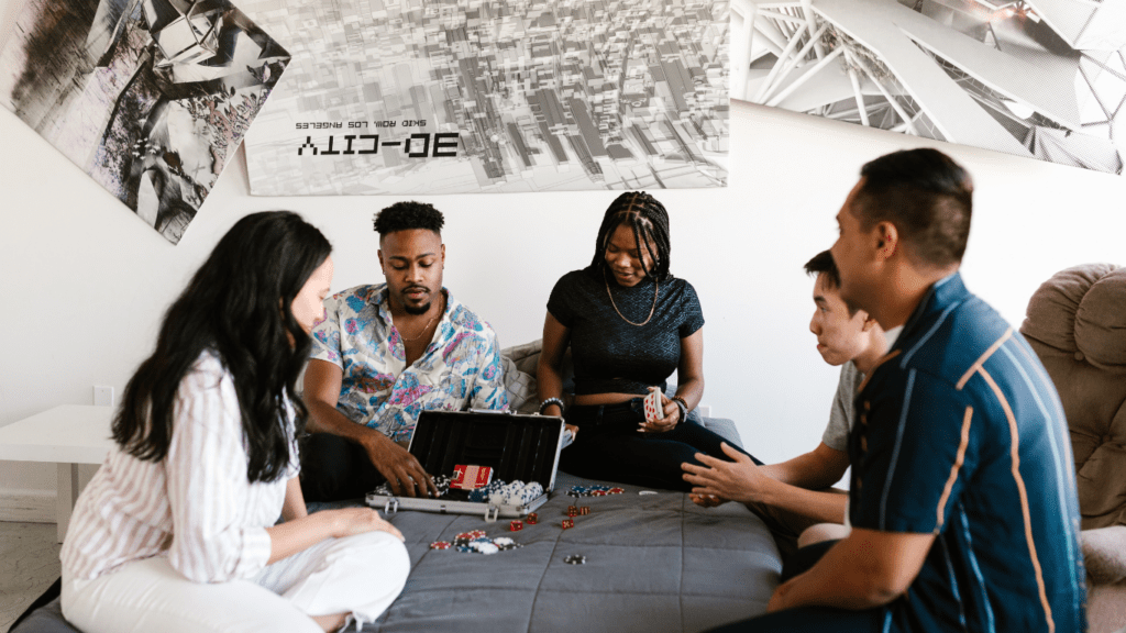 a group of people playing poker